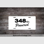 Chevrolet 348 C.i. Powered Engine Size License Plate White With Black Text